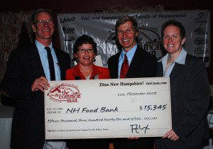 Common Man Owner Alex Ray and Judy Gove of the New Hampshire Electric Co-Op join New Hampshire Governor John Lynch in presenting a donation of $15,345 to New Hampshire Food Bank Executive Director Melanie Gosselin.