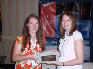 NHBSR Program Director Kate Luczko presents the 2010 Cornerstone Award to C&S Wholesale Grocers Community Involvement Program Director Erin Temmen. 