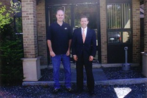 Atlantic Safety Products President David Dillon Jr. celebrates his company's relocation to Pittsfield, NH with NH Division of Economic Development Business Development Manager Michael Bergeron.